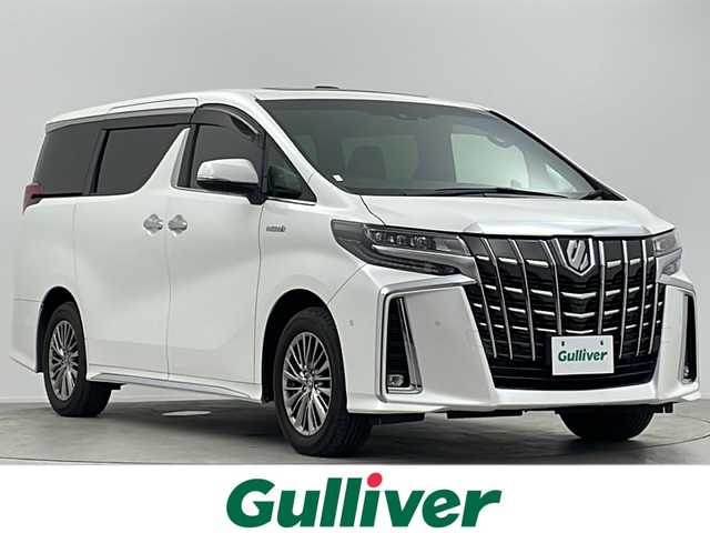 トヨタ アルファードハイブリット エグゼクティブ ラウンジ S 大阪府 2020(令2)年 2.6万km ホワイトパールクリスタルシャイン 純正10.5incメーカーナビ/【フルセグTV/Bluetooth/CD/DVD/HDMI】/純正後席モニター/JBLプレミアムサウンド/ツインムーンルーフ/パワーバックドア/ブラインドスポットモニター(BSM)/パノラマミックビューモニター/トヨタセーフティセンス/プリクラッシュセーフティ/レーンキープアシスト/オートマチックハイビーム/レザーシート/シートベンチレーション/シートヒーター/ステアリングヒーター/AC100V電源/保証書/取扱説明書/点検記録簿/スマートキー/スペアキー1本