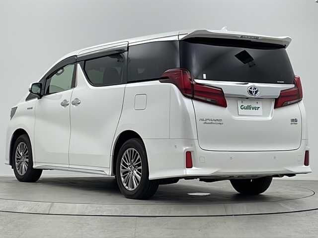 トヨタ アルファードハイブリット エグゼクティブ ラウンジ S 大阪府 2020(令2)年 2.6万km ホワイトパールクリスタルシャイン 純正10.5incメーカーナビ/【フルセグTV/Bluetooth/CD/DVD/HDMI】/純正後席モニター/JBLプレミアムサウンド/ツインムーンルーフ/パワーバックドア/ブラインドスポットモニター(BSM)/パノラマミックビューモニター/トヨタセーフティセンス/プリクラッシュセーフティ/レーンキープアシスト/オートマチックハイビーム/レザーシート/シートベンチレーション/シートヒーター/ステアリングヒーター/AC100V電源/保証書/取扱説明書/点検記録簿/スマートキー/スペアキー1本