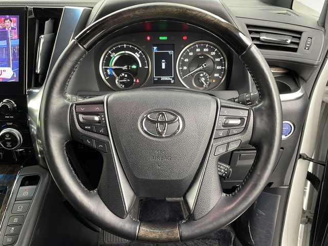 トヨタ アルファードハイブリット エグゼクティブ ラウンジ S 大阪府 2020(令2)年 2.6万km ホワイトパールクリスタルシャイン 純正10.5incメーカーナビ/【フルセグTV/Bluetooth/CD/DVD/HDMI】/純正後席モニター/JBLプレミアムサウンド/ツインムーンルーフ/パワーバックドア/ブラインドスポットモニター(BSM)/パノラマミックビューモニター/トヨタセーフティセンス/プリクラッシュセーフティ/レーンキープアシスト/オートマチックハイビーム/レザーシート/シートベンチレーション/シートヒーター/ステアリングヒーター/AC100V電源/保証書/取扱説明書/点検記録簿/スマートキー/スペアキー1本