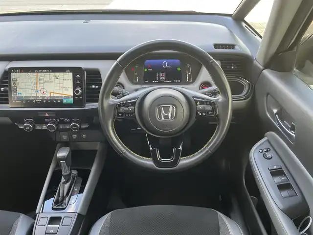 ホンダ フィット e:HEV RS 兵庫県 2022(令4)年 1.1万km プラチナホワイトパール ・ワンオーナー/・無限エアロ//フロントアンダー/サイド/リヤアンダースポイラー/・無限フロントグリルガーニッシュ/・無限カーボンテールゲートガーニッシュ/・無限17インチAW/・HONDA CONNECTナビ/・地デジ/BT/USB/Apple Car Play/Android Auto/・バックカメラ/・ステアリングリモコン/・パドルシフト/・ビルトインETC/・デイタイムランニングライト/・ドライブレコーダー（前方）/・アダプティブクルーズコントロール/・CMBS警告/・先行車発進お知らせ/・路外逸脱抑制制御/・レーンキープアシストシステム/・標識認識機能/・リヤパーキングセンサー/・コーナーセンサー/・オートハイビーム/・R5/6ディーラー点検記録簿