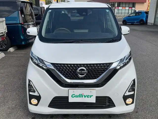 日産 デイズ HWS G ターボ プロパイロットED 滋賀県 2019(令1)年 3.9万km ホワイトパール ワンオーナー /車検令和8年7月まで/プロパイロット/インテリジェントエマージェンシーブレーキ/純正リモコンエンジンスターター/純正15インチアルミホイール/LEDヘッドランプ/・オートライト/・ハイビームアシスト/・ハロゲンフォグランプ/純正9インチナビゲーション（MM3118D-L）/・フルセグTV/・CD/DVD/・Bluetooth/アラウンドビューモニター/ETC/純正ドライブレコーダー/プレミアムコンビネーションインテリア/・ブラウン革巻きステアリング/・ブラウン合皮貼インパネ加飾/・ブラックアクセント入りブラウン合皮シート/ステアリングスイッチ/・オーディオ操作/・クルーズコントロール/・プロパイロット/取扱説明書/保証書/スペアキー/