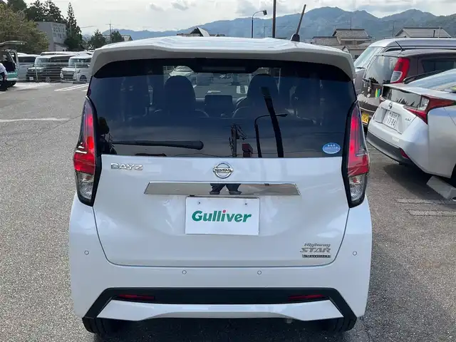 日産 デイズ HWS G ターボ プロパイロットED 滋賀県 2019(令1)年 3.9万km ホワイトパール ワンオーナー /車検令和8年7月まで/プロパイロット/インテリジェントエマージェンシーブレーキ/純正リモコンエンジンスターター/純正15インチアルミホイール/LEDヘッドランプ/・オートライト/・ハイビームアシスト/・ハロゲンフォグランプ/純正9インチナビゲーション（MM3118D-L）/・フルセグTV/・CD/DVD/・Bluetooth/アラウンドビューモニター/ETC/純正ドライブレコーダー/プレミアムコンビネーションインテリア/・ブラウン革巻きステアリング/・ブラウン合皮貼インパネ加飾/・ブラックアクセント入りブラウン合皮シート/ステアリングスイッチ/・オーディオ操作/・クルーズコントロール/・プロパイロット/取扱説明書/保証書/スペアキー/