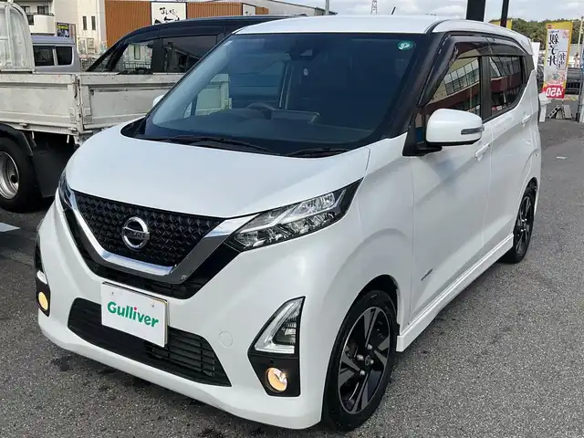 日産 デイズ HWS G ターボ プロパイロットED 滋賀県 2019(令1)年 3.9万km ホワイトパール ワンオーナー /車検令和8年7月まで/プロパイロット/インテリジェントエマージェンシーブレーキ/純正リモコンエンジンスターター/純正15インチアルミホイール/LEDヘッドランプ/・オートライト/・ハイビームアシスト/・ハロゲンフォグランプ/純正9インチナビゲーション（MM3118D-L）/・フルセグTV/・CD/DVD/・Bluetooth/アラウンドビューモニター/ETC/純正ドライブレコーダー/プレミアムコンビネーションインテリア/・ブラウン革巻きステアリング/・ブラウン合皮貼インパネ加飾/・ブラックアクセント入りブラウン合皮シート/ステアリングスイッチ/・オーディオ操作/・クルーズコントロール/・プロパイロット/取扱説明書/保証書/スペアキー/