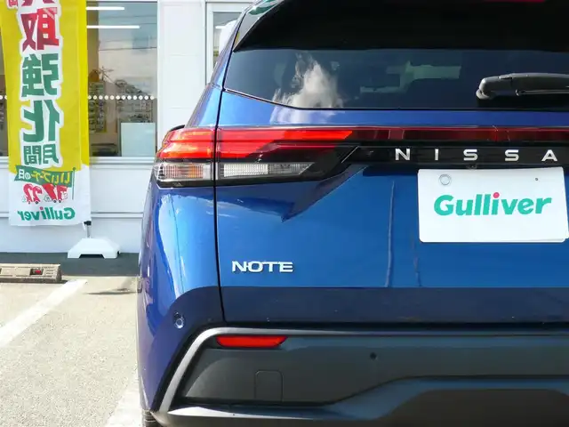 日産 ノート X 静岡県 2021(令3)年 2.1万km オーロラフレアブルーパール 禁煙車/プロパイロット/ニッサンコネクトナビ/アラウンドビューモニター/フルセグテレビ/AppleCarPlay/AndroidAuto/Bluetooth/置くだけ充電/デジタルインナーミラー/電子パーキング/AUTO HOLD/ドライブレコーダー/BSW/BSI/RCTA/スマートキー/スペアキー/ETC2.0/新車保証書/取扱説明書