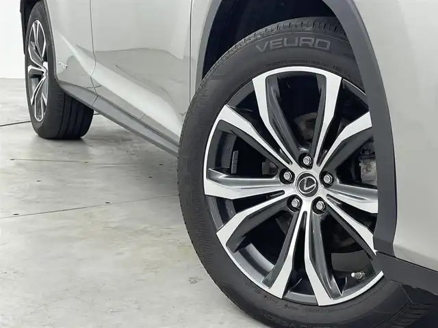 レクサス ＲＸ 450hL 福岡県 2019(令1)年 7.7万km ソニックチタニウム サンルーフ　/メーカーナビ　/全方位カメラ　/ＥＴＣ　/ドラレコ　/ＡＣＣ　/コーナーセンサー　/衝突軽減ブレーキ　/レーンキープ　/ＢＳＭ　/ＰＫＳＢ　/パドルシフト　/シートヒーター／ベンチレーション　/パワーバックドア