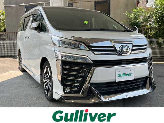 トヨタ ヴェルファイア Z Gエディション 京都府 2019(平31)年 6.8万km ホワイトパールクリスタルシャイン ワンオーナー/純正SDナビ/フルセグTV/モデリスタエアロ/サンルーフ/ＥＴＣ2.0/禁煙車/トヨタセーフティセンス/フリップダウンモニター/（V12T-R68C)/ＢＳＭ/デジタルインナーミラー/Ｄ席ポジションメモリー/前後ドライブレコーダー/ (HDR361GW)/オットマン/3列シート/パワーシート/  D席、N席、2列目/合皮シート/シートヒーター/   D席、N席有/エアシート/   D席、N席有/両側パワースライドドア/バックカメラ/レーンキープアシスト/3眼LED