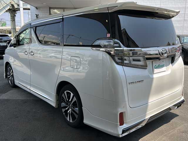 トヨタ ヴェルファイア Z Gエディション 京都府 2019(平31)年 6.8万km ホワイトパールクリスタルシャイン ワンオーナー/純正SDナビ/フルセグTV/モデリスタエアロ/サンルーフ/ＥＴＣ2.0/禁煙車/トヨタセーフティセンス/フリップダウンモニター/（V12T-R68C)/ＢＳＭ/デジタルインナーミラー/Ｄ席ポジションメモリー/前後ドライブレコーダー/ (HDR361GW)/オットマン/3列シート/パワーシート/  D席、N席、2列目/合皮シート/シートヒーター/   D席、N席有/エアシート/   D席、N席有/両側パワースライドドア/バックカメラ/レーンキープアシスト/3眼LED