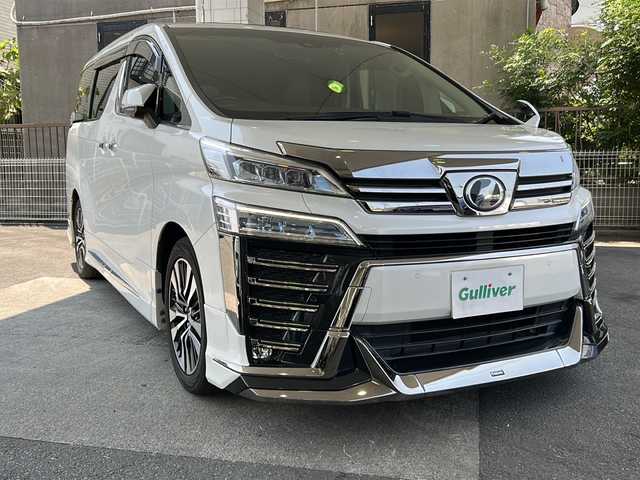 トヨタ ヴェルファイア Z Gエディション 京都府 2019(平31)年 6.8万km ホワイトパールクリスタルシャイン ワンオーナー/純正SDナビ/フルセグTV/モデリスタエアロ/サンルーフ/ＥＴＣ2.0/禁煙車/トヨタセーフティセンス/フリップダウンモニター/（V12T-R68C)/ＢＳＭ/デジタルインナーミラー/Ｄ席ポジションメモリー/前後ドライブレコーダー/ (HDR361GW)/オットマン/3列シート/パワーシート/  D席、N席、2列目/合皮シート/シートヒーター/   D席、N席有/エアシート/   D席、N席有/両側パワースライドドア/バックカメラ/レーンキープアシスト/3眼LED