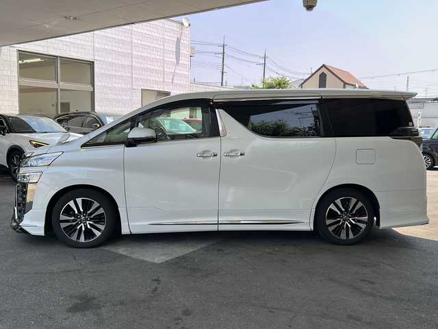 トヨタ ヴェルファイア Z Gエディション 京都府 2019(平31)年 6.8万km ホワイトパールクリスタルシャイン ワンオーナー/純正SDナビ/フルセグTV/モデリスタエアロ/サンルーフ/ＥＴＣ2.0/禁煙車/トヨタセーフティセンス/フリップダウンモニター/（V12T-R68C)/ＢＳＭ/デジタルインナーミラー/Ｄ席ポジションメモリー/前後ドライブレコーダー/ (HDR361GW)/オットマン/3列シート/パワーシート/  D席、N席、2列目/合皮シート/シートヒーター/   D席、N席有/エアシート/   D席、N席有/両側パワースライドドア/バックカメラ/レーンキープアシスト/3眼LED