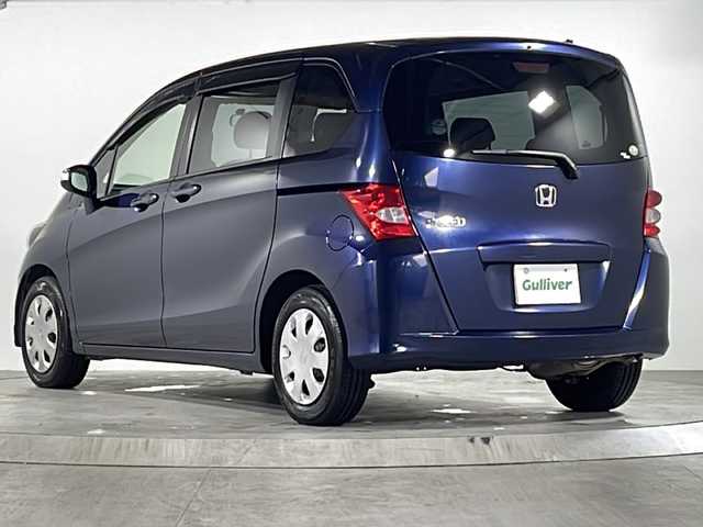 ホンダ フリード G ジャストセレクション 広島県 2010(平22)年 4.9万km プレミアムナイトブルーパール 禁煙/2列目ベンチシート【８人乗り】/純正オーディオ/・AM/FM/AUX/CD/オートライト/ＨＩＤヘッドライト/片側パワースライドドア/電動格納ウィンカーミラー/ドアバイザー/純正フロアマット