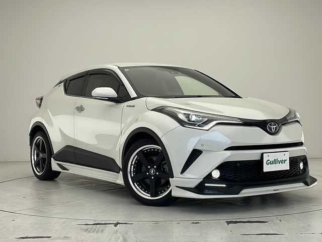 トヨタ Ｃ－ＨＲ G LEDエディション 沖縄県 2018(平30)年 6.3万km ホワイトパールクリスタルシャイン 純正9インチナビ（NSZT-Y66T）/（フルセグTV　DVD　Bluetooth接続）/バックカメラ/ETC/トヨタセーフティセンス/ステアリングスイッチ/ハーフレザーシート/シートヒーター/TRDエアロ/コーナーセンサー/ブラインドスポットモニター/スマートキー/プッシュスタート/LEDヘッドライト/オートライト/シートカバー付き/純正フロアマット/TVキャンセラー付き
