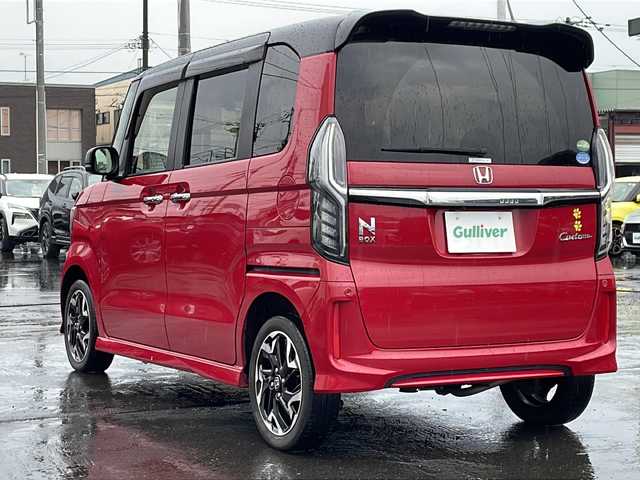 ホンダ Ｎ ＢＯＸ カスタム G L ターボ ホンダセンシング 道北・旭川 2019(令1)年 4.6万km ミラノレッド ・４ＷＤ/・禁煙車/・ディーラーオプションメモリーナビ/　フルセグ・ＣＤ・ＤＶＤ・ＢＴ・ＳＤ/・ステアリングリモコン/・バックカメラ/・両側パワースライドドア/・ホンダセンシング/　レーダークルーズコントロール/　衝突軽減ブレーキ/　先行者発進お知らせ/　レーンキープアシスト/　標識認識機能/・ルーフコンソール/・ビルトインETC/・前後ドライブレコーダー/・降車時オートドアロック/・LEDオートライト/・ハーフレザーシート/・シートヒーター /・ミラーヒーター /・パドルシフト/・純正１５インチアルミ/・新車時保証書