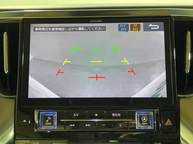 トヨタ アルファードハイブリット X 神奈川県 2018(平30)年 5.2万km パール 4WD/社外アルパイン11型メモリーナビゲーション【EX11Z】/社外アルパインフリップダウンモニター【PXHEX-R-AV】/ワンセグ　CD DVD　SD　iPod　Bluetooth　AUX　HDMI　/サイド/リアカメラ/両側電動スライドドア/デジタルインナーミラー/AC100V/純正ビルトインETC/セーフティセンス/レーダークルーズコントロール/プリクラッシュセーフティ/レーントレーシングアシスト/パーキングサポートブレーキ/ロードサインアシスト/先行車発進お知らせ機能/前後ソナー/ハイビームアシスト/2列目オットマン/社外前方ドライブレコーダー/革巻きステアリング/電動パーキングブレーキ/オートブレーキホールド/プッシュスタート/スマートキー/LEDヘッドランプ/フロントフォグランプ/オートライト/純正18インチアルミホイール/純正リアスポイラー/取説　保証書　スペアキー