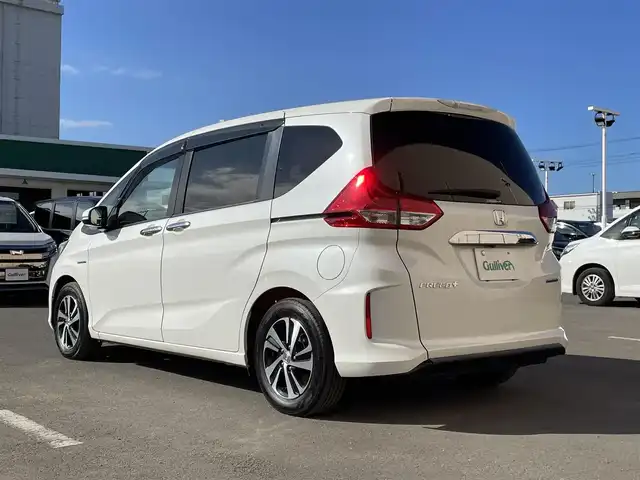 ホンダ フリード＋ ハイブリット EX 東京都 2018(平30)年 7万km ホワイトオーキッドパール 純正ナビ　/バックカメラ　/Bluetooth　/CD　/DVD　/フルセグTV　/両側電動スライドドア　/レーダークルーズコントロールシステム　/ドライブレコーダー　/ETC　/純正アルミホイール　/フロアマット　/純正LED/ホンダセンシング/ABS/横滑り防止装置/レーンアシスト/衝突被害軽減システム