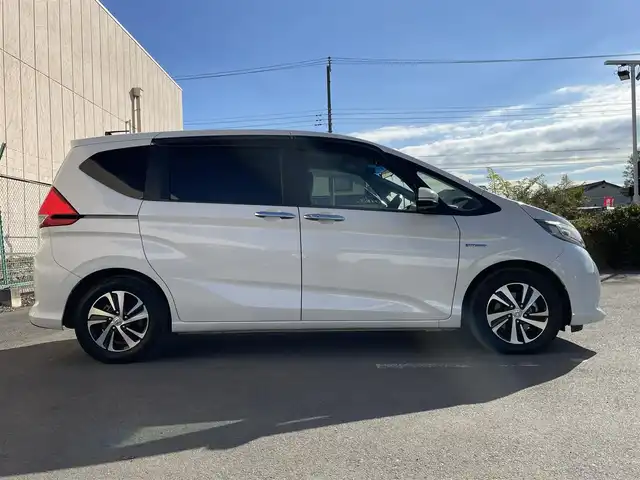 ホンダ フリード＋ ハイブリット EX 東京都 2018(平30)年 7万km ホワイトオーキッドパール 純正ナビ　/バックカメラ　/Bluetooth　/CD　/DVD　/フルセグTV　/両側電動スライドドア　/レーダークルーズコントロールシステム　/ドライブレコーダー　/ETC　/純正アルミホイール　/フロアマット　/純正LED/ホンダセンシング/ABS/横滑り防止装置/レーンアシスト/衝突被害軽減システム