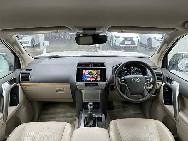 トヨタ ランドクルーザー プラド TX Lパッケージ 佐賀県 2018(平30)年 3.1万km ホワイトパールクリスタルシャイン モデリスタエアロ/ルーフレール/4WD/トヨタセーフティセンス/・プリクラッシュセーフティ/・レーンディパーチャーアラート/・レーダークルーズコントロール/・オートマチックハイビーム/クリアランスソナー/社外8インチナビ/・バックカメラ/・フルセグTV/BT/CD/DVD/ベージュ革シート/前席シートベンチレーション/前席シートヒーター/前席パワーシート/電動格納サードシート/純正19インチAW/LEDヘッドライト/フォグランプ/ETC/エアバックW/サイド/カーテン/スペアキー×１/取扱説明書/保証書