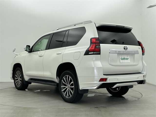 トヨタ ランドクルーザー プラド TX Lパッケージ 富山県 2018(平30)年 3.1万km ホワイトパールクリスタルシャイン モデリスタエアロ/ルーフレール/4WD/トヨタセーフティセンス/・プリクラッシュセーフティ/・レーンディパーチャーアラート/・レーダークルーズコントロール/・オートマチックハイビーム/クリアランスソナー/社外8インチナビ/・バックカメラ/・フルセグTV/BT/CD/DVD/ベージュ革シート/前席シートベンチレーション/前席シートヒーター/前席パワーシート/電動格納サードシート/純正19インチAW/LEDヘッドライト/フォグランプ/ETC/エアバックW/サイド/カーテン/スペアキー×１/取扱説明書/保証書