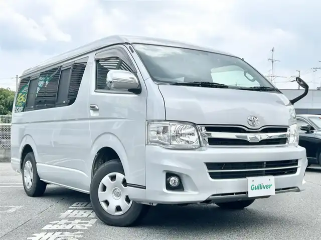 トヨタ ハイエース GL ロング 奈良県 2011(平23)年 4.2万km シルバー フリップダウンモニター１２インチ/ロール式テント（ＦＩＡＭＭＡ　Ｆ４５Ｓ）/片側パワースライドドア/社外ナビ【ＮＲ－ＭＺ０３】（ＣＤ／ＤＶＤ／ＢＴ）/ＡＣ１００Ｖ/ＥＴＣ/スペアキーｘ１/バックカメラ/カーテン後付け/フォグ/純正ドアバイザー/純正フロアマット/オートエアコン