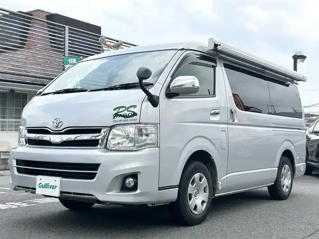 トヨタ ハイエース GL ロング 奈良県 2011(平23)年 4.2万km シルバー フリップダウンモニター１２インチ/ロール式テント（ＦＩＡＭＭＡ　Ｆ４５Ｓ）/片側パワースライドドア/社外ナビ【ＮＲ－ＭＺ０３】（ＣＤ／ＤＶＤ／ＢＴ）/ＡＣ１００Ｖ/ＥＴＣ/スペアキーｘ１/バックカメラ/カーテン後付け/フォグ/純正ドアバイザー/純正フロアマット/オートエアコン