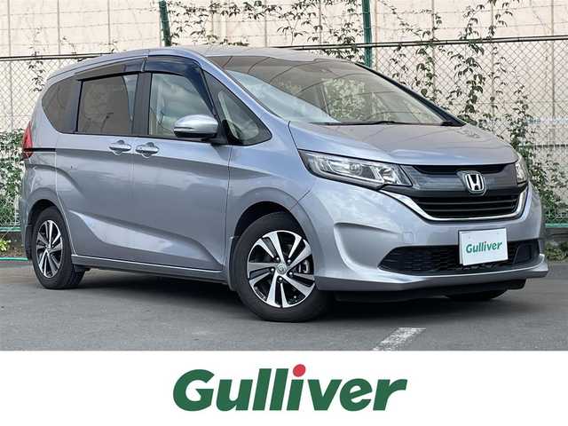 ホンダ フリード G ホンダセンシング 東京都 2017(平29)年 3万km シルバー 純正ナビ/ホンダセンシング/・衝突軽減ブレーキ/・車線維持支援システム/・アダプティブクルーズコントロール/アイドリングストップ/両側パワースライドドア/シートカバー/フルセグTV/・DVD/CD再生機能/・Bluetooth接続/バックカメラ/革巻きステアリング/ETC/LEDヘッドライト/純正15インチアルミホイル/スマートキー/純正ゴムマット