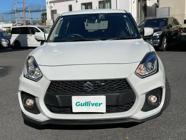 スズキ スイフト スポーツ 神奈川県 2024(令6)年 1.3万km ピュアホワイトP ワンオーナー/純正8インチメモリーナビ・地デジTV/純正CD/DVD/SD/MSV/USB/BT/バック・サイドカメラ/ETC/前後ドライブレコーダー/運転シートヒーター/純正17インチAW/LEDライト/レーダークルーズコントロール/衝突軽減ブレーキ・LKA・コーナーセンサー/パドルシフト/ステアリングスイッチ/プッシュスタート/スマートキー×2/R6年ディーラー整備記録/保証書・取説あり