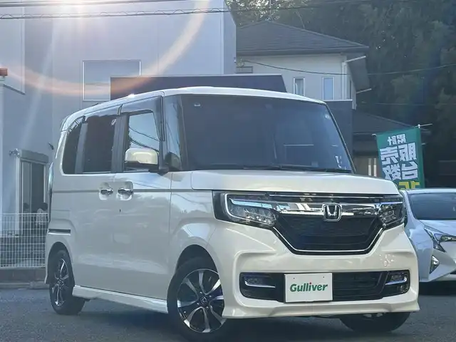 ホンダ Ｎ ＢＯＸ カスタム G EX ホンダセンシング 熊本県 2017(平29)年 6.3万km プレミアムホワイトパールⅡ ワンオーナー/純正ナビ（VXM-174VFi）/【フルセグ/CD/DVD/Bluetooth/ラジオ】/バックカメラ/ビルトインETC/両側パワースライドドア/レーダークルーズコントロール/レーンキープアシスト/衝突軽減ブレーキ/先行車発進お知らせ機能/標識認識機能/リヤコーナーセンサー/純正14インチAW/オートライト/LEDヘッドライト/フォグランプ/ステアリングスイッチ/純正フロアマット/保証書/取扱説明書