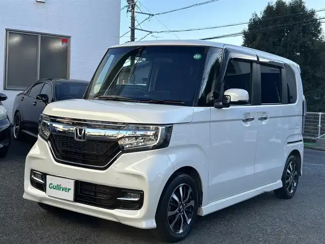 ホンダ Ｎ ＢＯＸ カスタム G EX ホンダセンシング 熊本県 2017(平29)年 6.3万km プレミアムホワイトパールⅡ ワンオーナー/純正ナビ（VXM-174VFi）/【フルセグ/CD/DVD/Bluetooth/ラジオ】/バックカメラ/ビルトインETC/両側パワースライドドア/レーダークルーズコントロール/レーンキープアシスト/衝突軽減ブレーキ/先行車発進お知らせ機能/標識認識機能/リヤコーナーセンサー/純正14インチAW/オートライト/LEDヘッドライト/フォグランプ/ステアリングスイッチ/純正フロアマット/保証書/取扱説明書