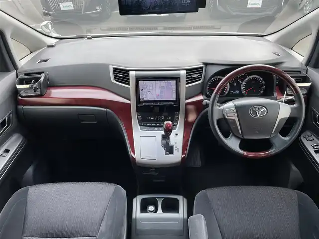 トヨタ ヴェルファイア 2．4Z 東京都 2009(平21)年 10.2万km ホワイトパールクリスタルシャイン 社外ナビ＆フルセグ　/社外フリップダウンモニター　/社外デジタルインナーミラー　/純正ウッドコンビステアリング　/両側パワースライドドア　/オットマンシート　/社外バックモニター /純正キセノンライト /コーナーセンサー/プッシュエンジンスタート/保証書＆取説/Wエアバック＆ABS