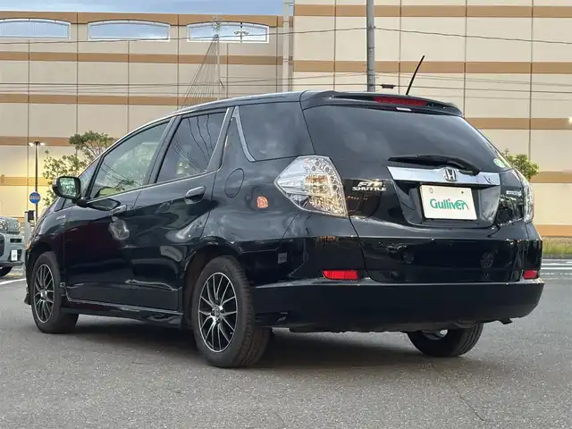 ホンダ フィット シャトル ハイブリッド スマートセレファインライン 宮城県 2013(平25)年 12.1万km クリスタルブラックパール 登録時走行距離120926km/SDナビ/CD/AM/FM/アイドリングストップ/横滑り防止/ETC/ステアリングリモコン/シートヒーター/寒冷地仕様/クルーズコントロール/オートライト/プッシュスタート/スマートキー/バックカメラ/純正フロアマット/フォグランプ