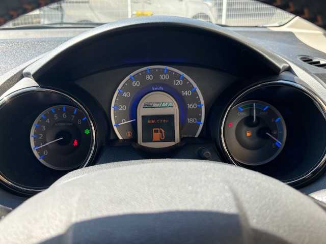 ホンダ フィット シャトル ハイブリッド スマートセレファインライン 宮城県 2013(平25)年 12.1万km クリスタルブラックパール 登録時走行距離120926km/SDナビ/CD/AM/FM/アイドリングストップ/横滑り防止/ETC/ステアリングリモコン/シートヒーター/寒冷地仕様/クルーズコントロール/オートライト/プッシュスタート/スマートキー/バックカメラ/純正フロアマット/フォグランプ