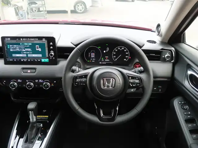 ホンダ ヴェゼル ハイブリッド e:HEV Z 千葉県 2025(令7)年 0.1千km プレミアムクリスタルレッドM 登録済未使用車/ホンダコネクトディスプレイ/ナビゲーション/フルセグTV/Bluetooth/AM/FM/USB/マルチビューカメラ/ホンダセンシング/BSI/ブラインドスポットインフォメーション/ハンズフリーアクセスパワーテールゲート/シートヒーター/ステアリングヒーター/ビルトインETC2.0/ハーフレザー/プレミアムオーディオ/純正18インチAW/レーダークルーズコントロール/パドルシフト/ワイヤレス充電/LEDヘッドライト/LEDフォグランプ/USB充電/スマートキー×2本/取説/保証書