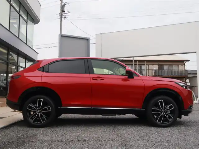 ホンダ ヴェゼル ハイブリッド e:HEV Z 千葉県 2025(令7)年 0.1千km プレミアムクリスタルレッドM 登録済未使用車/ホンダコネクトディスプレイ/ナビゲーション/フルセグTV/Bluetooth/AM/FM/USB/マルチビューカメラ/ホンダセンシング/BSI/ブラインドスポットインフォメーション/ハンズフリーアクセスパワーテールゲート/シートヒーター/ステアリングヒーター/ビルトインETC2.0/ハーフレザー/プレミアムオーディオ/純正18インチAW/レーダークルーズコントロール/パドルシフト/ワイヤレス充電/LEDヘッドライト/LEDフォグランプ/USB充電/スマートキー×2本/取説/保証書