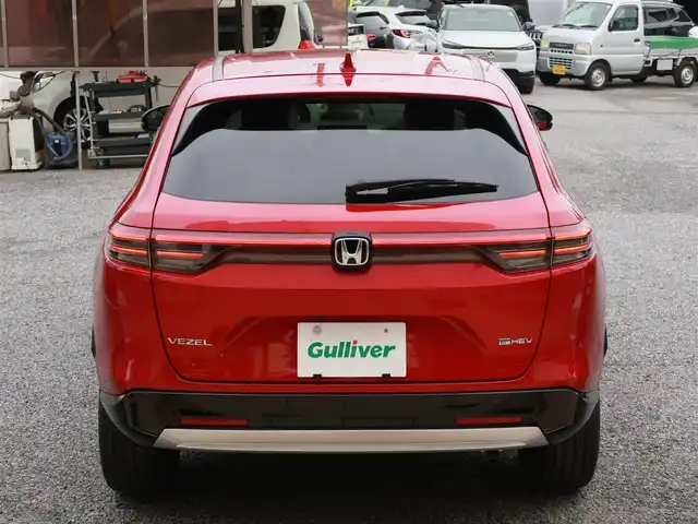 ホンダ ヴェゼル ハイブリッド e:HEV Z 千葉県 2025(令7)年 0.1千km プレミアムクリスタルレッドM 登録済未使用車/ホンダコネクトディスプレイ/ナビゲーション/フルセグTV/Bluetooth/AM/FM/USB/マルチビューカメラ/ホンダセンシング/BSI/ブラインドスポットインフォメーション/ハンズフリーアクセスパワーテールゲート/シートヒーター/ステアリングヒーター/ビルトインETC2.0/ハーフレザー/プレミアムオーディオ/純正18インチAW/レーダークルーズコントロール/パドルシフト/ワイヤレス充電/LEDヘッドライト/LEDフォグランプ/USB充電/スマートキー×2本/取説/保証書