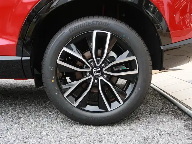 ホンダ ヴェゼル ハイブリッド e:HEV Z 千葉県 2025(令7)年 0.1千km プレミアムクリスタルレッドM 登録済未使用車/ホンダコネクトディスプレイ/ナビゲーション/フルセグTV/Bluetooth/AM/FM/USB/マルチビューカメラ/ホンダセンシング/BSI/ブラインドスポットインフォメーション/ハンズフリーアクセスパワーテールゲート/シートヒーター/ステアリングヒーター/ビルトインETC2.0/ハーフレザー/プレミアムオーディオ/純正18インチAW/レーダークルーズコントロール/パドルシフト/ワイヤレス充電/LEDヘッドライト/LEDフォグランプ/USB充電/スマートキー×2本/取説/保証書