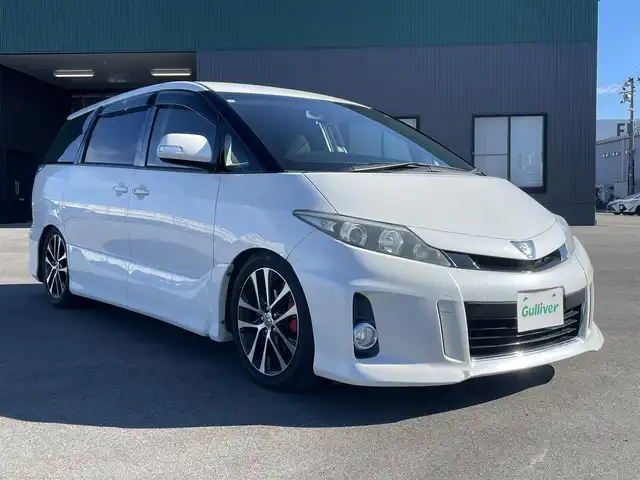トヨタ エスティマ アエラス 新潟県 2013(平25)年 10.3万km ホワイトパールクリスタルシャイン スマートキー/プッシュスタート/両側パワースライドドア/純正ナビ(NSZT-W62G)/　CD/DVD/BT/フルセグ/バックカメラ/アルパインフリップダウンモニター/純正18インチアルミ/ETC/車高調/革巻きステアリング/ステアリングスイッチ/純正フロアマット/純正ドアバイザー/オートライト