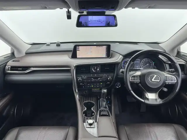 レクサス ＲＸ 450hL 富山県 2018(平30)年 6.5万km グラファイトブラックガラスフレーク 純正ナビ（AM/FM/CD/DVD/BD/AUX/USB/BT）/フルセグTV/パノラミックビューモニター/Fスポーツグリル/TRDフロントエアロ/サンルーフ/プリクラッシュセーフティ/レーンキーピングアシスト/オートマチックハイビーム/レーダークルーズコントロール/ブラインドスポットモニター/クリアランスソナー/ヘッドアップディスプレイ/本革シート（ノーブルブラウン）/1列目メモリ付きシート/パワーシート/1/2列目シートヒーター/1列目エアシート/電動格納サードシート/ステアリングヒーター/純正20インチAW/3眼LEDヘッドライト/LEDフォグランプ/シーケンシャルランプ/置くだけ充電/100V充電/デジタルインナーミラー/ドライブレコーダー前後/ビルトインETC2.0/パドルシフト/オートブレーキホールド/電動パーキングブレーキ/純正フロアマット/スペアキー/カードキーあり/プッシュスタート/取扱説明書/保証書