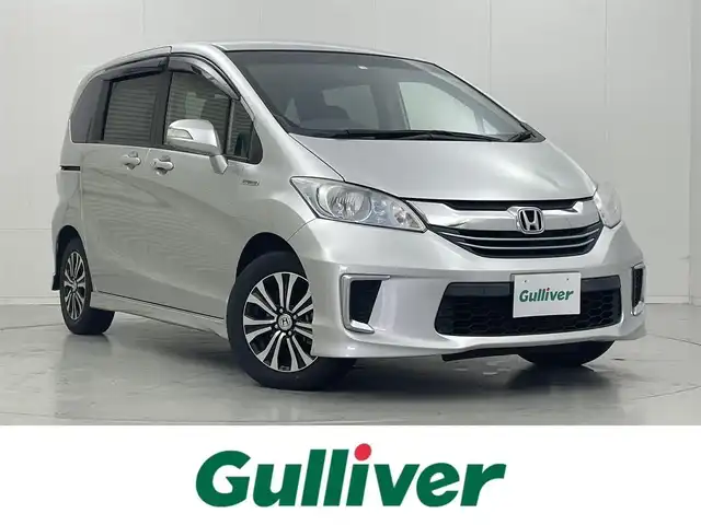 ホンダ フリード ハイブリット ジャストセレクション 茨城県 2014(平26)年 5.7万km スーパープラチナメタリック 純正ナビ［VXM-145VFi］/ワンセグ再生可/バックカメラ/両側パワースライドドア/寒冷地仕様/クルーズコントロール/純正アルミホイール/純正フロアマット/ハーフレザーシート/ビルトインETC