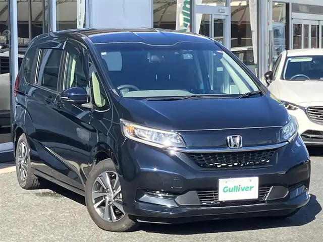 ホンダ フリード G ホンダセンシング 山口県 2020(令2)年 5.6万km ミッドナイトブルービームM 9inメモリーナビ・フルセグTV/フリップダウンモニター/バックカメラ/両側パワースライドドア /純正フロアマット/純正ドアバイザー/純正15インチアルミ/フロントシートヒーター/LEDオートライト/ビルトインETC/スマートキー/エンジンプッシュスタート