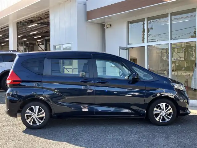 ホンダ フリード G ホンダセンシング 山口県 2020(令2)年 5.6万km ミッドナイトブルービームM 9inメモリーナビ・フルセグTV/フリップダウンモニター/バックカメラ/両側パワースライドドア /純正フロアマット/純正ドアバイザー/純正15インチアルミ/フロントシートヒーター/LEDオートライト/ビルトインETC/スマートキー/エンジンプッシュスタート