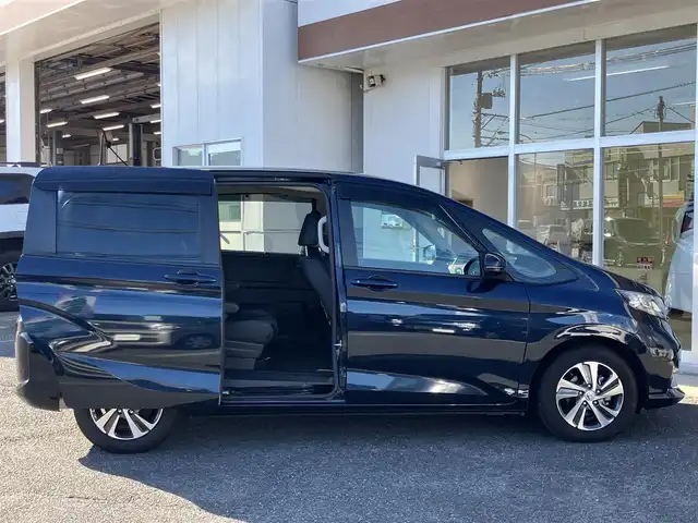 ホンダ フリード G ホンダセンシング 山口県 2020(令2)年 5.6万km ミッドナイトブルービームM 9inメモリーナビ・フルセグTV/フリップダウンモニター/バックカメラ/両側パワースライドドア /純正フロアマット/純正ドアバイザー/純正15インチアルミ/フロントシートヒーター/LEDオートライト/ビルトインETC/スマートキー/エンジンプッシュスタート