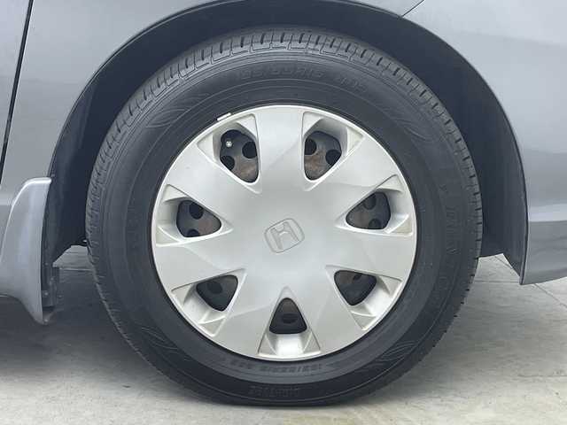 ホンダ フリード G Lパッケージ 宮城県 2008(平20)年 6.9万km ポリッシュドメタルメタリック 純正ＨＤＤナビ　ＥＴＣ　前後ドライブレコーダー　バックカメラ　片側パワースライドドア　オートライト　革巻きステアリング　ステアリングスイッチ　バニティミラー　電動格納ミラー　スタッドレス４本　禁煙車