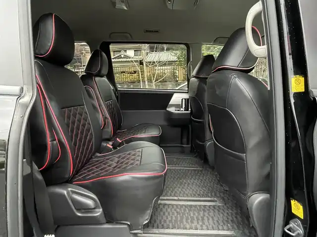 トヨタ ヴォクシー ZS 煌 埼玉県 2010(平22)年 7.1万km ブラック ワンオーナー/純正ナビTV/純正フリップダウンモニター/バックカメラ/ビルトインETC/プッシュスタート/パドルシフト/両側パワースライドドア/オートライト/ＨＩＤヘッドライト/革調シートカバー/取扱説明書/保証書付整備手帳