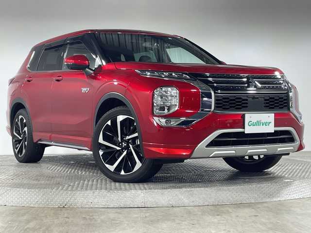 三菱 アウトランダー ＰＨＥＶ P 神奈川県 2022(令4)年 0.9万km レッドダイヤモンド e-Assist/純正ナビ/・BT/フルセグTV/USB/360°カメラ/パノラマサンルーフ/レザーシート/パワーシート(D/N)/メモリシート(D/N)/全席シートヒーター/置くだけ充電/リフレッシュ機能/BOSE/電動サイドブレーキ/オートホールド/AC100V/革巻きステアリング/ステアリングスイッチ/パドルシフト/Autoライト/ステアリングヒーター/ビルトインETC/前後ドライブレコーダー/スマートキー/プッシュスタートボタン/LEDヘッドライト/フォグランプ/電動格納ミラー/ウィンカーミラー/フロントデアイサー/POWER/ECO/TARMAC/GRAVEL/SNOW/MUDモード/パワーバックドア/純正フロアマット/純正ドアバイザー/純正20インチアルミホイール