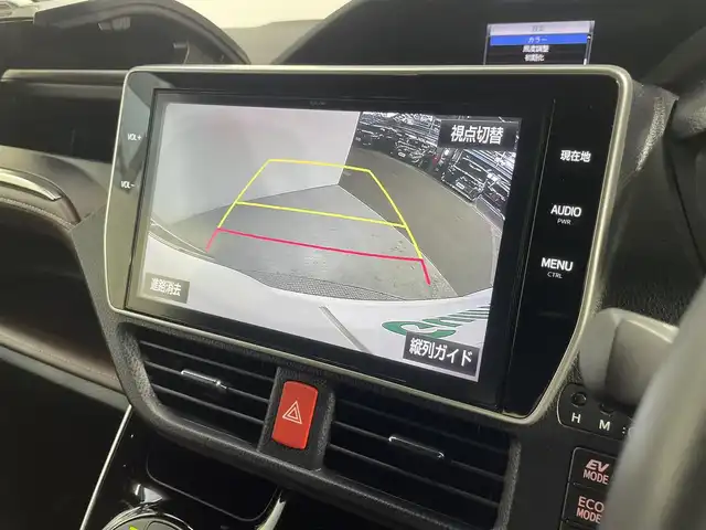 トヨタ エスクァイア ハイブリッド Gi 大阪府 2018(平30)年 3.8万km ホワイトパールクリスタルシャイン 登録時38714Km/純正ナビ（NSZN-Z６６T）/前後ドラレコ/バックカメラ/フリップダウンモニター/クルコン（追従なし）/両側パワースライドドア　/ＬＥＤオートライト　/オートハイビーム　/衝突被害軽減　/横すべり防止/クリアランスソナー/シートヒーター　/電動格納ミラー　/スペアキー　/取説