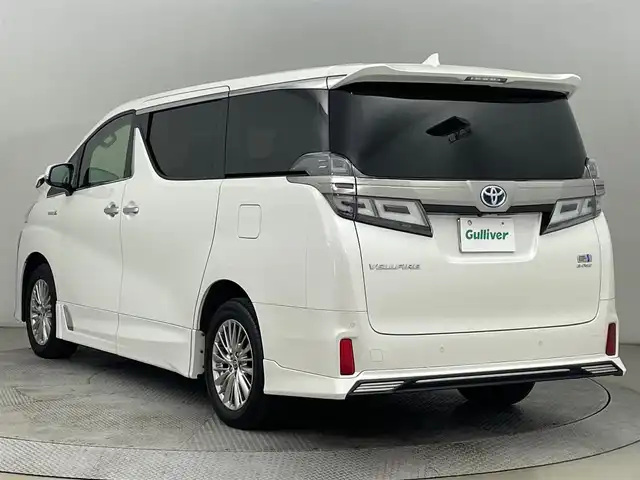 トヨタ ヴェルファイア ハイブリット Z 道央・札幌 2020(令2)年 6.7万km ホワイトパールクリスタルシャイン ・ワンオーナー/・TRDエアロ（サイド＆リヤ）/・４WD/・MOP９型ディスプレイオーディオ/　OPナビキット/OPフルセグTV/　Miracast/CD/DVD/BT/USB/・ステアリングスイッチ/・バックカメラ/・ビルトインETC2.0（ナビ連動）/・ドライブレコーダー前後/・AC100V/・トヨタセーフティセンス/　PCS/PKSB/LTA/RSA/　クリアランスソナー/先行車発進告知/・レーダークルーズコントロール/・横滑り防止装置/・ECO MODE/・EV MODE/・ブレーキホールド/・nanoe付WAC/・パワーバックドア/・両側パワースライドドア/・オートマチックハイビーム/・オートライト/・LEDヘッドライト/・LEDフォグランプ/・LEDフットイルミネーション/・ドアミラーウィンカー/・オートリトラクタブルドアミラー/・純正１７インチAW/・純正フロアマット/・プッシュスタート/・スマートキー/・スペアキー/・取/保