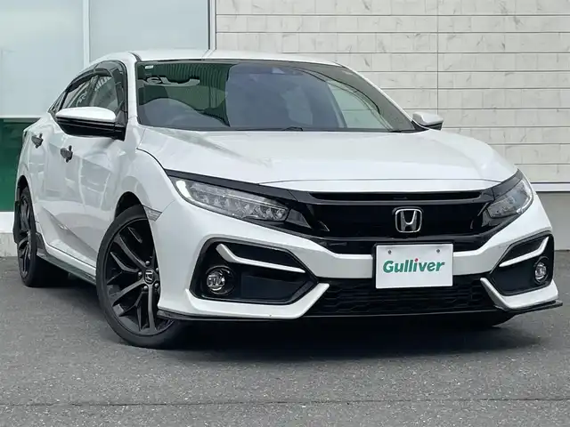 ホンダ シビック ハッチバック 岩手県 2021(令3)年 9.3万km プラチナホワイトパール ワンオーナー/純正SDナビ/AM/FM/CD/DVD/Bluetooth/フルセグTV/バックカメラ/ビルトインETC2.0/レーダークルーズコントロール/衝突被害軽減ブレーキ/レーンキープアシスト/横滑り防止装置/アイドリングストップ/パワーシート/シートヒーター/オートライト/LEDヘッドライト/フォグランプ/スマートキー/プッシュスタート/電動格納ミラー/純正18インチAW/純正フロアマット/ドアバイザー/保証書/取扱説明書