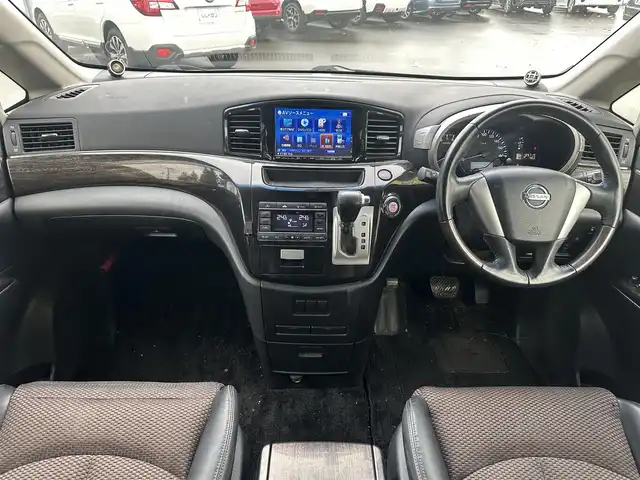 日産 エルグランド 250HWS アーバンクロム 道北・旭川 2013(平25)年 12.6万km ファントムブラック (株)IDOMが運営する【じしゃロン旭川店】の自社ローン専用車両になります。こちらは現金またはオートローンご利用時の価格です。自社ローンご希望の方は別途その旨お申付け下さい/　/・社外ナビ(CD/DVD/BT/HDD/SD/フルセグ)/・バックカメラ/・ETC/・ドライブレコーダー/・両側パワースライドドア/・フリップダウンモニター/・電動格納ウィンカーミラー/・プッシュスタート/・スマートキー1個/・フォグランプ/・積込スタッドレスタイヤ/・取扱説明書