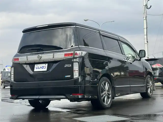 日産 エルグランド 250HWS アーバンクロム 道北・旭川 2013(平25)年 12.6万km ファントムブラック (株)IDOMが運営する【じしゃロン旭川店】の自社ローン専用車両になります。こちらは現金またはオートローンご利用時の価格です。自社ローンご希望の方は別途その旨お申付け下さい/　/・社外ナビ(CD/DVD/BT/HDD/SD/フルセグ)/・バックカメラ/・ETC/・ドライブレコーダー/・両側パワースライドドア/・フリップダウンモニター/・電動格納ウィンカーミラー/・プッシュスタート/・スマートキー1個/・フォグランプ/・積込スタッドレスタイヤ/・取扱説明書