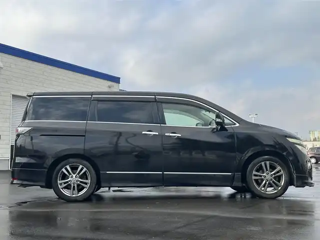 日産 エルグランド 250HWS アーバンクロム 道北・旭川 2013(平25)年 12.6万km ファントムブラック (株)IDOMが運営する【じしゃロン旭川店】の自社ローン専用車両になります。こちらは現金またはオートローンご利用時の価格です。自社ローンご希望の方は別途その旨お申付け下さい/　/・社外ナビ(CD/DVD/BT/HDD/SD/フルセグ)/・バックカメラ/・ETC/・ドライブレコーダー/・両側パワースライドドア/・フリップダウンモニター/・電動格納ウィンカーミラー/・プッシュスタート/・スマートキー1個/・フォグランプ/・積込スタッドレスタイヤ/・取扱説明書