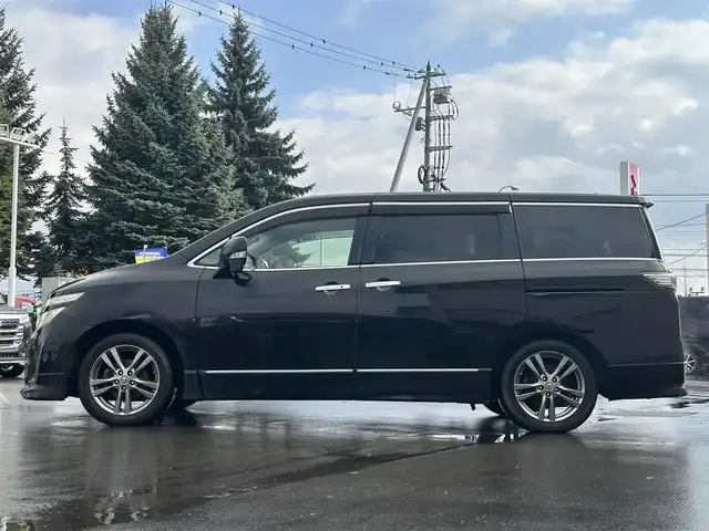 日産 エルグランド 250HWS アーバンクロム 道北・旭川 2013(平25)年 12.6万km ファントムブラック (株)IDOMが運営する【じしゃロン旭川店】の自社ローン専用車両になります。こちらは現金またはオートローンご利用時の価格です。自社ローンご希望の方は別途その旨お申付け下さい/　/・社外ナビ(CD/DVD/BT/HDD/SD/フルセグ)/・バックカメラ/・ETC/・ドライブレコーダー/・両側パワースライドドア/・フリップダウンモニター/・電動格納ウィンカーミラー/・プッシュスタート/・スマートキー1個/・フォグランプ/・積込スタッドレスタイヤ/・取扱説明書